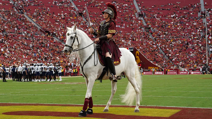 Sep 2, 2023; Los Angeles, California, USA; Southern Calfiornia Trojans white horse mascot Traveler with female rider Dana Kanstu during the game against the Nevada Wolf Pack United Airlines Field at Los Angeles Memorial Coliseum. Mandatory Credit: Kirby Lee-Imagn Images