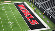 The UNLV Rebels logo in the end zone is seen before the Mountain West Championship between the Boise State Broncos and the UNLV Rebels at Allegiant Stadium. Mandatory Credit: Kirby Lee-Imagn Images