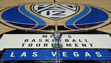 Mar 16, 2024; Las Vegas, NV, USA; The 2024 Pac-12 Conference men's basketball champion trophy at center court on the Pac-12 logo at T-Mobile Arena. Mandatory Credit: Kirby Lee-Imagn Images