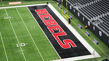 Dec 2, 2023; Las Vegas, NV, USA; The UNLV Rebels logo in the end zone is seen before the Mountain West Championship between the Boise State Broncos and the UNLV Rebels at Allegiant Stadium. Mandatory Credit: Kirby Lee-Imagn Images