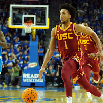 Mar 8, 2025; Los Angeles, California, USA; Southern California Trojans guard Desmond Claude (1) dribbles against the UCLA Bruins in the first half at Pauley Pavilion presented by Wescom. Mandatory Credit: Kirby Lee-Imagn Images