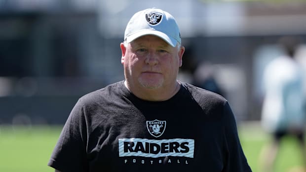 Chip Kelly on the field at Raiders training camp.