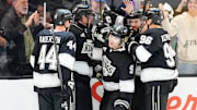 Apr 21, 2025; Los Angeles, California, USA; LA Kings right wing Adrian Kempe (9) celebrates with defenseman Mikey Anderson (44), center Anze Kopitar (11), defenseman Drew Doughty (8) and left wing Andrei Kuzmenko (96) after scoring a goal against the Edmonton Oilers in the second period of game one of the first round of the 2025 Stanley Cup Playoffs at Crypto.com Arena. Mandatory Credit: Kirby Lee-Imagn Images
