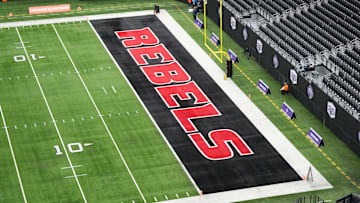 Dec 2, 2023; Las Vegas, NV, USA; The UNLV Rebels logo in the end zone is seen before the Mountain West Championship between the Boise State Broncos and the UNLV Rebels at Allegiant Stadium. Mandatory Credit: Kirby Lee-Imagn Images