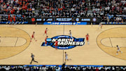 The NCAA March Madness Sweet 16 and Elite Eight logo at midcourt 