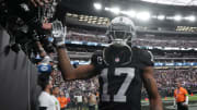 Dec 10, 2023; Paradise, Nevada, USA; Las Vegas Raiders wide receiver Davante Adams (17) is greeted by fans during teh game against the Minnesota Vikings at Allegiant Stadium. Mandatory Credit: Kirby Lee-USA TODAY Sports