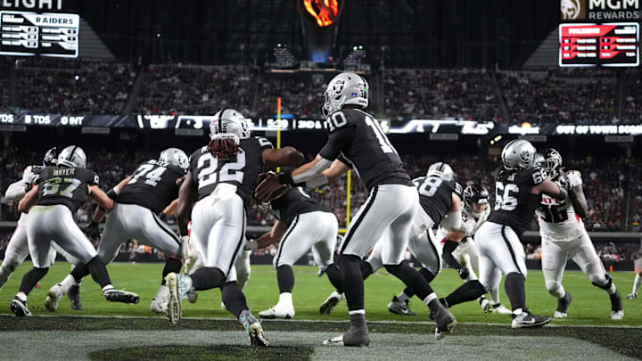 A general overall view as Las Vegas Raiders quarterback Desmond Ridder (10) hands the ball off to running back Alexander Mattison (22) in the first half against the Atlanta Falcons at Allegiant Stadium. A general overall view as Las Vegas Raiders quarterback Desmond Ridder (10) hands the ball off to running back Alexander Mattison (22) in the first half against the Atlanta Falcons at Allegiant Stadium.