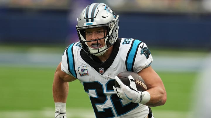 Oct 16, 2022; Inglewood, California, USA; Carolina Panthers running back Christian McCaffrey (22) carries the ball against the Los Angeles Rams in the first half at SoFi Stadium.