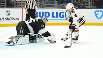 Nov 2, 2024; Los Angeles, California, USA; Chicago Blackhawks center Ryan Donato (8) shoots the puck against LA Kings goaltender Darcy Kuemper (35) for a goal in overtime at Crypto.com Arena. Mandatory Credit: Kirby Lee-Imagn Images