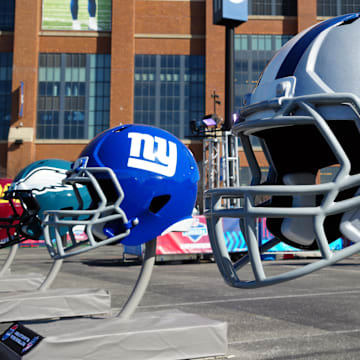 Feb 28, 2024; Indianapolis, IN, USA; A general view of large Dallas Cowboys and New York Giants helmets at the NFL Scouting Combine Experience at Lucas Oil Stadium. 