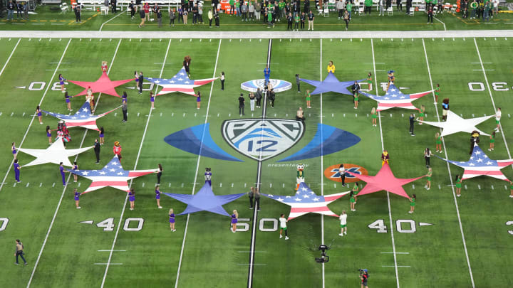 Dec 1, 2023; Las Vegas, NV, USA; The Pac-12 Conference logo at midfield during the playing of the national anthem of the Pac-12 Championshp game at Allegiant Stadium. Mandatory Credit: Kirby Lee-USA TODAY Sports