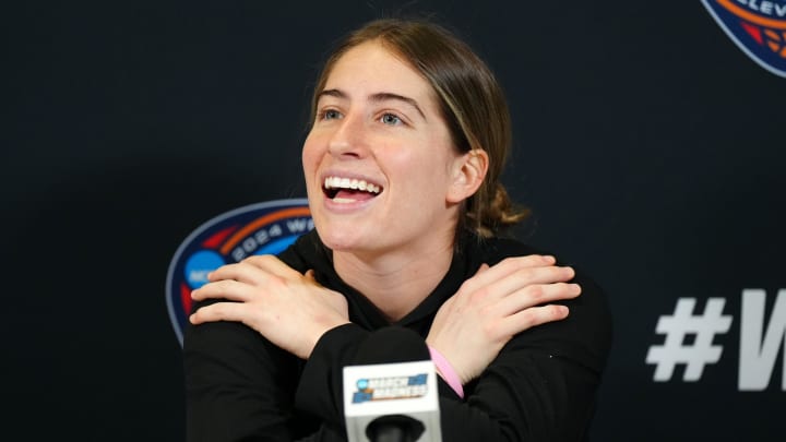 Apr 6, 2024; Cleveland, OH, USA; Iowa Hawkeyes guard Kate Martin speaks at press conference at Rocket Mortgage FieldHouse. Mandatory Credit: Kirby Lee-USA TODAY Sports