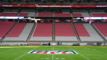 Feb 7, 2023; Phoenix, AZ, USA; The NFL shield logo at midfield pror to Super Bown 57 at State Farm