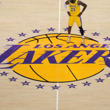 Jan 17, 2024; Los Angeles, California, USA; Los Angeles Lakers forward LeBron James (23) stands on the Lakers logo at center court in the first half against the Dallas Mavericks at Crypto.com Arena. Mandatory Credit: Kirby Lee-USA TODAY Sports