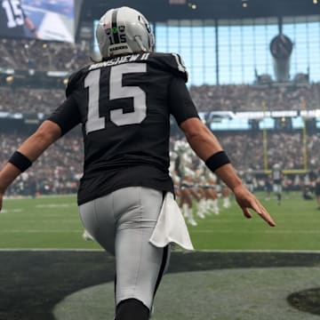 Sep 22, 2024; Paradise, Nevada, USA; Las Vegas Raiders quarterback Gardner Minshew (15) enters the field before the game against the Carolina Panthers at Allegiant Stadium. Mandatory Credit: Kirby Lee-Imagn Images