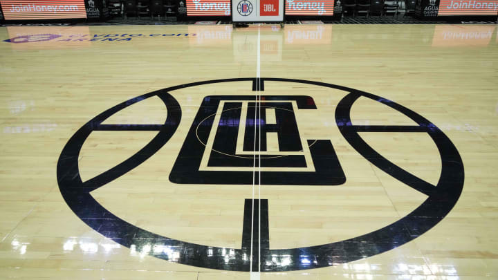 Jan 3, 2022; Los Angeles, California, USA; A detailed view of the LA Clippers logo at midcourt at the Crypto.com Arena. Mandatory Credit: Kirby Lee-USA TODAY Sports Jan 3, 2022; Los Angeles, California, USA; A detailed view of the LA Clippers logo at midcourt at the Crypto.com Arena. Mandatory Credit: Kirby Lee-USA TODAY Sports