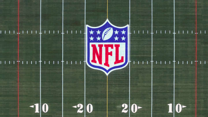 Feb 2, 2024; Orlando, FL, USA; The NFL shield logo on the 2024 Pro Bowl Games flag football field at Camping World Stadium.  
