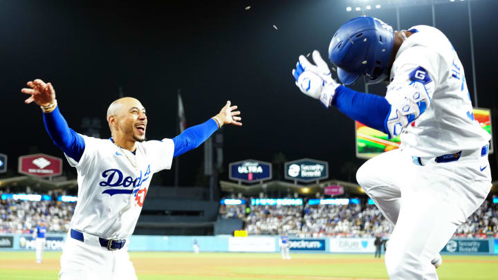 Jun 11, 2024; Los Angeles, California, USA; Los Angeles Dodgers left fielder Teoscar Hernandez (37) celebrates with shortstop Mookie Betts (50) after hitting a two-run home run in the sixth inning against the Texas Rangers at Dodger Stadium. Mandatory Credit: Kirby Lee-USA TODAY Sports