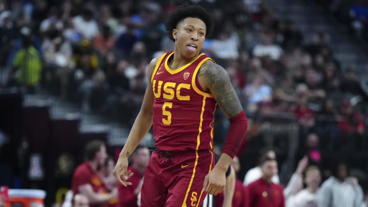 Mar 13, 2024; Las Vegas, NV, USA; Southern California Trojans guard Boogie Ellis (5) reacts after a three-point basket against the Washington Huskies at T-Mobile Arena. Mandatory Credit: Kirby Lee-USA TODAY Sports