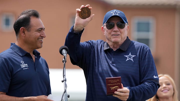 Dallas Cowboys owner Jerry Jones receives a medallion from Oxnard mayor Luis McArthur at NFL training camp Dallas Cowboys owner Jerry Jones receives a medallion from Oxnard mayor Luis McArthur at NFL training camp