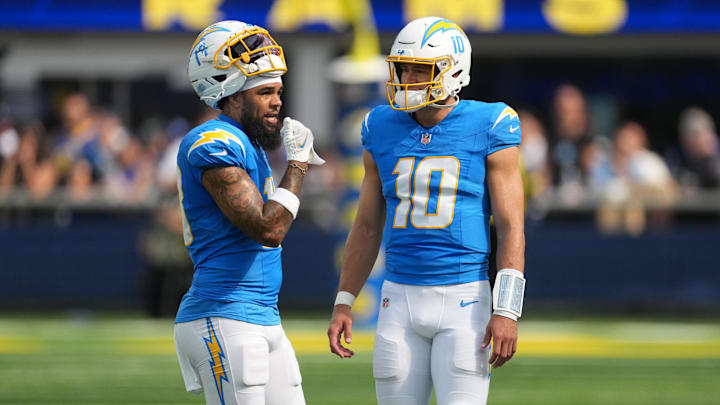 Los Angeles Chargers quarterback Justin Herbert talks with wide receiver Keenan Allen against the Los Angeles Rams 