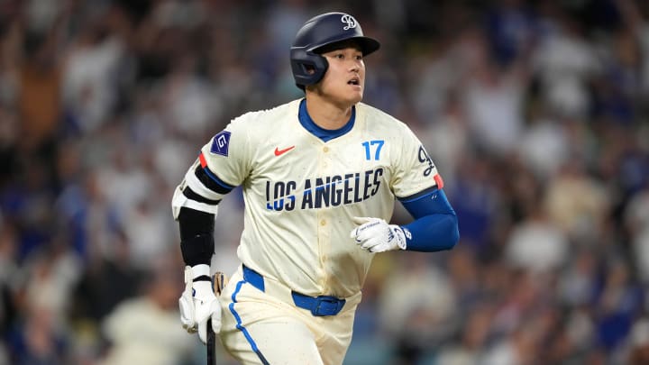 Aug 24, 2024; Los Angeles, California, USA; Los Angeles Dodgers designated hitter Shohei Ohtani (17) runs the bases after hitting a two-run home run in the fifth inning against the Tampa Bay Rays at Dodger Stadium. Mandatory Credit: Kirby Lee-USA TODAY Sports