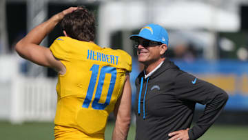 Justin Herbert has no bigger fan than Jim Harbaugh.