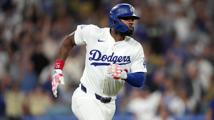 Aug 20, 2024; Los Angeles, California, USA; Los Angeles Dodgers right fielder Jason Heyward (23) runs the bases after hitting a three-run home run in the eighth inning against the Seattle Mariners at Dodger Stadium