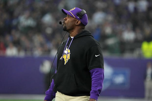 Minnesota Vikings defensive coordinator Brian Flores watches from the sidelines against the New York Jets