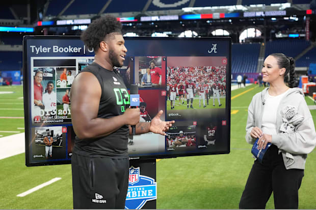 Alabama offensive lineman Tyler Booker is interviewed by NFL Network reporter Kimmi Chex during the 2025 NFL Combine.
