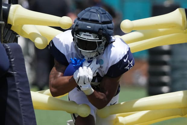 Dallas Cowboys running back Jaydon Blue carries the ball at training camp at the River Ridge Fields. 