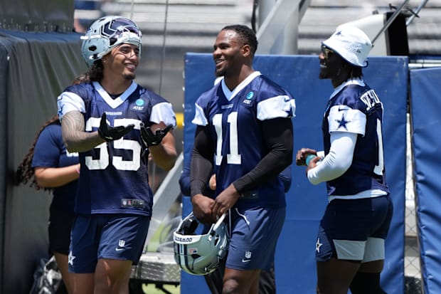 Dallas Cowboys defenders Marist Liufau, Micah Parsons, and DeMarvion Overshown during training camp at the River Ridge Fields