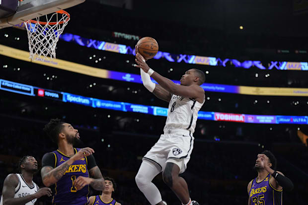 Brooklyn Nets guard Lonnie Walker IV (8) shoots the ball during a game against the Los Angeles Lakers.