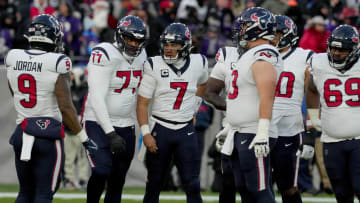 Jan 20, 2024; Baltimore, MD, USA; Houston Texans quarterback C.J. Stroud (7) huddles with teammates during the first quarter of a 2024 AFC divisional round game against the Baltimore Ravens at M&T Bank Stadium. Mandatory Credit: Mitch Stringer-USA TODAY Sports