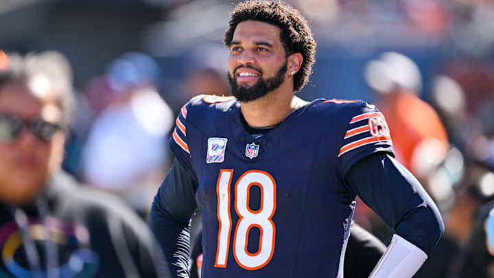 Oct 6, 2024; Chicago, Illinois, USA; Chicago Bears quarterback Caleb Williams (18) looks on from the sideline against the Carolina Panthers during the third quarter at Soldier Field. Mandatory Credit: Daniel Bartel-Imagn Images Oct 6, 2024; Chicago, Illinois, USA; Chicago Bears quarterback Caleb Williams (18) looks on from the sideline against the Carolina Panthers during the third quarter at Soldier Field. Mandatory Credit: Daniel Bartel-Imagn Images