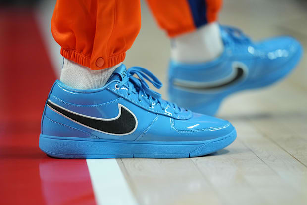 P.J. Tucker's blue and black Nike sneakers.