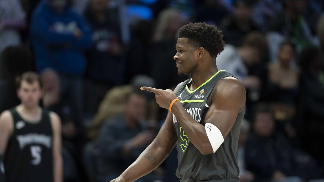 Jan 11, 2026; Minneapolis, Minnesota, USA; Minnesota Timberwolves guard Anthony Edwards (5) points to the San Antonio Spurs bench in the first half at Target Center. Mandatory Credit: Jesse Johnson-Imagn Images