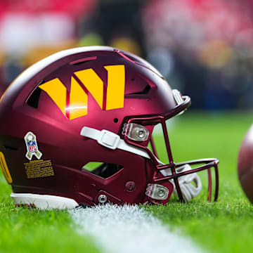 Washington Commanders helmet on the field at Northwest Stadium