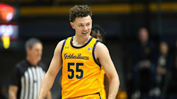 Jan 22, 2023; Berkeley, California, USA; California Golden Bears guard Devin Askew (55) reacts after scoring against the Oregon State Beavers during the first half at Haas Pavilion. Mandatory Credit: Darren Yamashita-Imagn Images