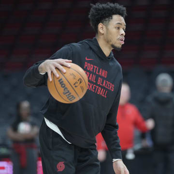 Mar 9, 2024; Portland, Oregon, USA;  Portland Trail Blazers shooting guard Anfernee Simons (1) warms up prior to a game against the Toronto Raptors at Moda Center.