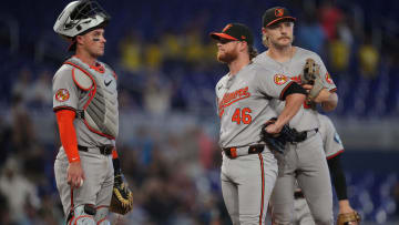 Jul 25, 2024; Miami, Florida, USA;  Baltimore Orioles pitcher Craig Kimbrel has a meeting at the mound in the ninth inning.