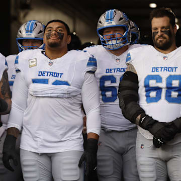 The Detroit Lions wait for player introductions.