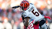 Cincinnati Bengals wide receiver Tee Higgins (5) breaks away from Tampa Bay Buccaneers safety Josh Hayes (32) on his way to the end zone on a catch in the first quarter of the NFL Preseason Week 1 game between the Cincinnati Bengals and the Tampa Bay Buccaneers at Paycor Stadium in downtown Cincinnati on Saturday, Aug. 10, 2024.