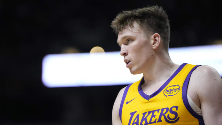 Jul 12, 2024; Las Vegas, NV, USA;  Los Angeles Lakers forward Dalton Knecht (4) competes during the first half against the Houston Rockets at the Thomas & Mack Center. Mandatory Credit: Lucas Peltier-USA TODAY Sports