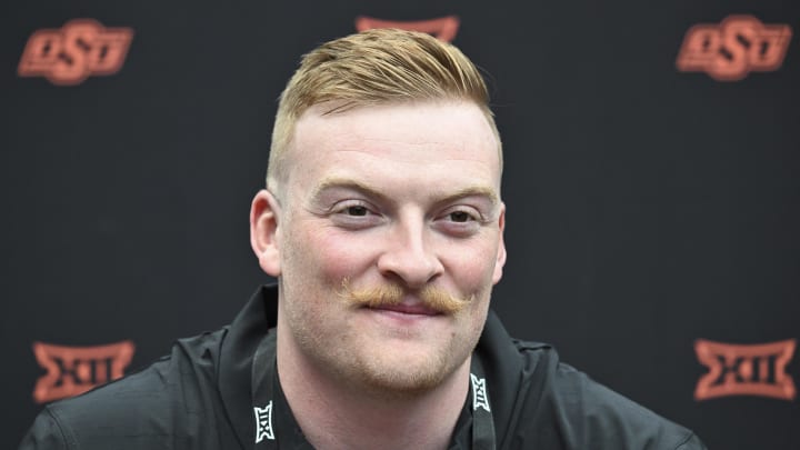 Jul 9, 2024; Las Vegas, NV, USA; Oklahoma State quarterback Alan Bowman speaks to the media during the Big 12 Media Days at Allegiant Stadium. Mandatory Credit: Candice Ward-USA TODAY Sports