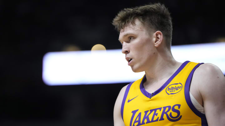 Jul 12, 2024; Las Vegas, NV, USA;  Los Angeles Lakers forward Dalton Knecht (4) competes during the first half against the Houston Rockets at the Thomas & Mack Center. Mandatory Credit: Lucas Peltier-USA TODAY Sports