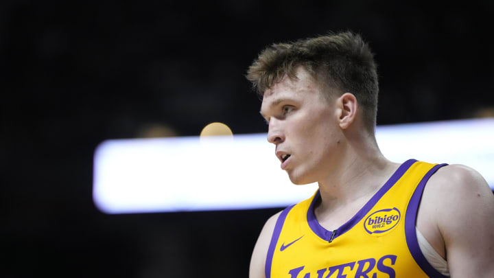 Jul 12, 2024; Las Vegas, NV, USA;  Los Angeles Lakers forward Dalton Knecht (4) competes during the first half against the Houston Rockets at the Thomas & Mack Center. Mandatory Credit: Lucas Peltier-USA TODAY Sports