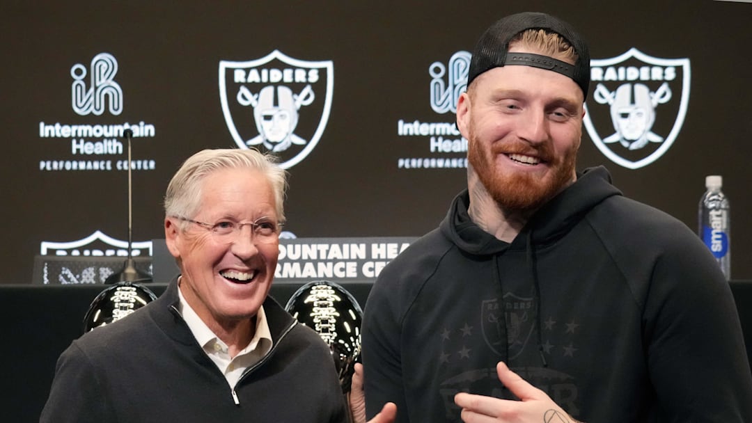 Jan 27, 2025; Las Vegas, NV, USA; Las Vegas Raiders defensive end Maxx Crosby (right) and coach Pete Carroll at press conference at Intermountain Health Performance Center. Mandatory Credit: Kirby Lee-Imagn Images