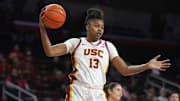 Dec 10, 2024; Los Angeles, California, USA; Southern California Trojans center Rayah Marshall (13) rebounds the ball against the Fresno State Bulldogs at Galen Center. USC defeated Fresno State 89-40. Mandatory Credit: Kirby Lee-Imagn Images