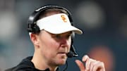 Dec 27, 2024; Las Vegas, NV, USA; Southern California Trojans head coach Lincoln Riley reacts against the Texas A&M Aggies in the second half at Allegiant Stadium. Mandatory Credit: Kirby Lee-Imagn Images